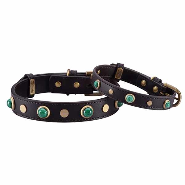 Black collar with green deals stones.